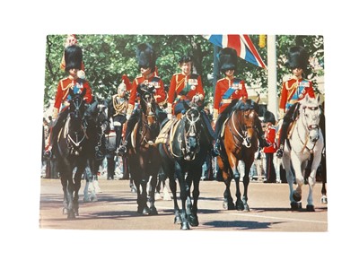 Lot 131 - H.M. Queen Elizabeth II and H.R.H. The Duke of Edinburgh signed 1986 Christmas card with photograph of the Royal couple taking part in the Trooping the Colour, signed ' Elizabeth R 1986 Philip' Pr...