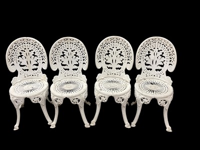 Lot 1301 - Four cast metal garden chairs