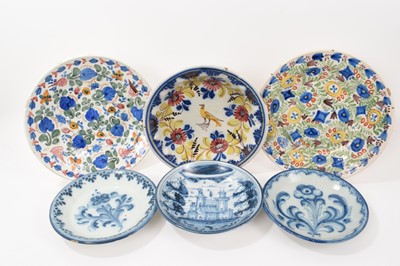 Lot 340 - A group of five decorative tin glazed earthenware dishes, including blue and white, and polychrome