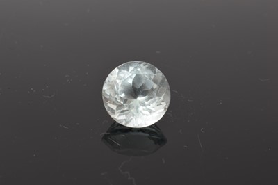 Lot 716 - Unmounted circular mixed cut aquamarine, measuring approximately 14.8mm diameter x 10.9mm deep, estimated to weigh approximately 12.2cts.