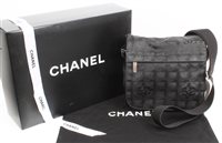 Lot 3193 - Chanel 1990s black logo Clocksth / canvas...