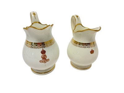 Lot 193 - Edwardian Windor Castle porcelain milk jug with painted crowned ERVII cypher and gold scroll band supplied by Goode & Co 13cm and another similar with painted Edwardian Crown similarly mark...