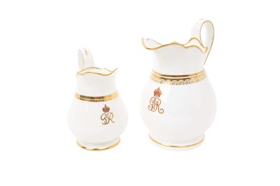 Lot 192 - King George V Large milk jug, probably Mintons with gilt scroll band and painted crowned GRV cyphers 16cm and similar Royal Crown Derby jug with painted crowned King George VI cypher 12cm (2)