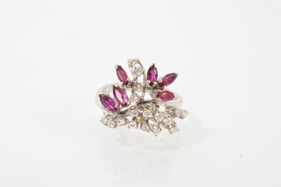 Lot 744 - Diamond and ruby floral spray cocktail ring in 18ct white gold setting