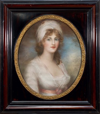 Lot 1266 - English School, early 19th century, pastel portrait of a young lady in white dress, oval, 59cm x 49cm, in oval gilt slip and moulded wooden frame