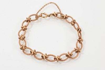 Lot 753 - 9ct gold bracelet with oval rope twist links, 19cm.
