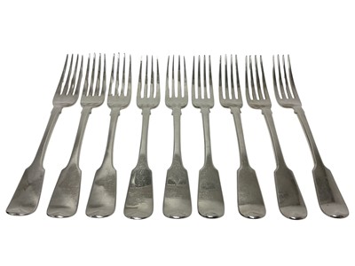 Lot 594 - Set of four William Irish silver fiddle pattern dinner forks, with engraved crests, (Dublin 1832), together with five similar dinner forks, (Dublin 1836), all at approx. 24ozs (8).