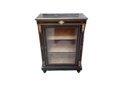 Lot 1596 - Victorian ebonised and gilt metal mounted pier cabinet, with porcelain floral plaque to the frieze and enclosed by glazed door