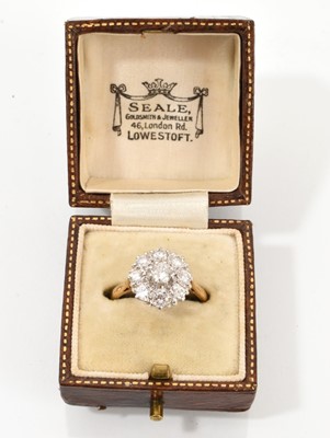 Lot 688 - Diamond flower head cluster ring on 18ct yellow gold shank