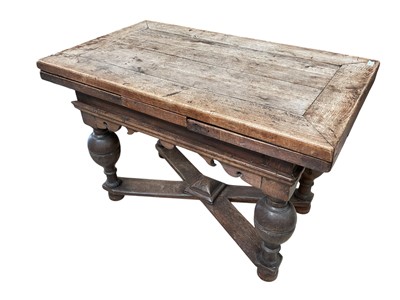 Lot 1600 - 17th century Dutch oak drawer leaf table, with cleated top on bulbous supports, 72cm wide x 124cm extending to 218cm