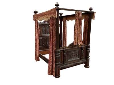 Lot 1606 - Antique carved oak four poster double bed with carved panels and turned supports