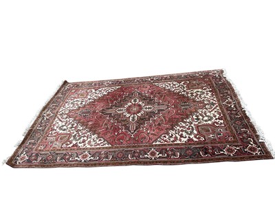 Lot 1644 - Heriz design carpet, centred by radiating medallion in main meander border, 295 x 202cm