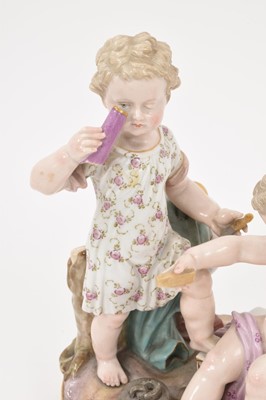 Lot 77 - 19th century Meissen figure group, an allegory of geometry, in the form of two cherubs with instruments, crossed swords and incised marks to base, 15.5cm high