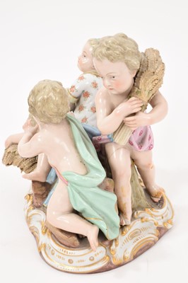 Lot 76 - 19th century Meissen figure group, an allegory of Summer, modelled with four figures carrying and resting on sheafs of wheat, crossed swords and incised model number '2490' to base, 16cm high<...