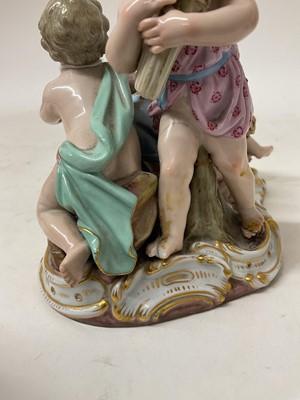 Lot 76 - 19th century Meissen figure group, an allegory of Summer, modelled with four figures carrying and resting on sheafs of wheat, crossed swords and incised model number '2490' to base, 16cm high<...