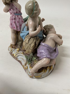 Lot 76 - 19th century Meissen figure group, an allegory of Summer, modelled with four figures carrying and resting on sheafs of wheat, crossed swords and incised model number '2490' to base, 16cm high<...