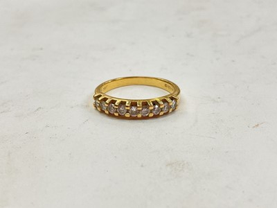 Lot 1088 - 18ct gold diamond nine stone half eternity ring (London import 1990), size L½
