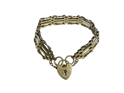 Lot 63 - Silver gilt gate bracelet with padlock clasp