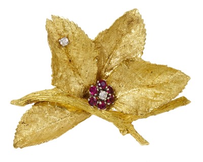 Lot 373 - 18ct ruby and diamond flower brooch