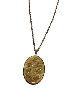 Lot 73 - 9ct gold large oval locket with floral decoration on 9ct gold chain, 59.5cm long