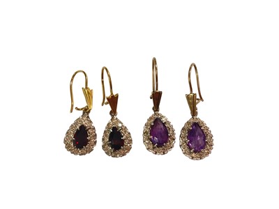 Lot 79 - Pair of garnet and diamond pear shaped cluster earrings on 18ct gold fittings, together with a similar pair of amethsyt and diamond pear shaped cluster earrings on 9ct gold fittings