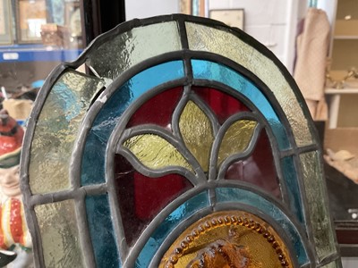 Lot 149 - Stained glass panel with intaglio panel