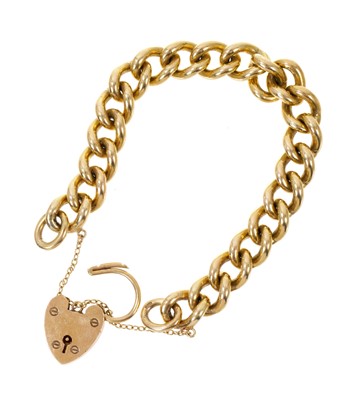 Lot 382 - Heavy 9ct gold curb link bracelet with padlock clasp