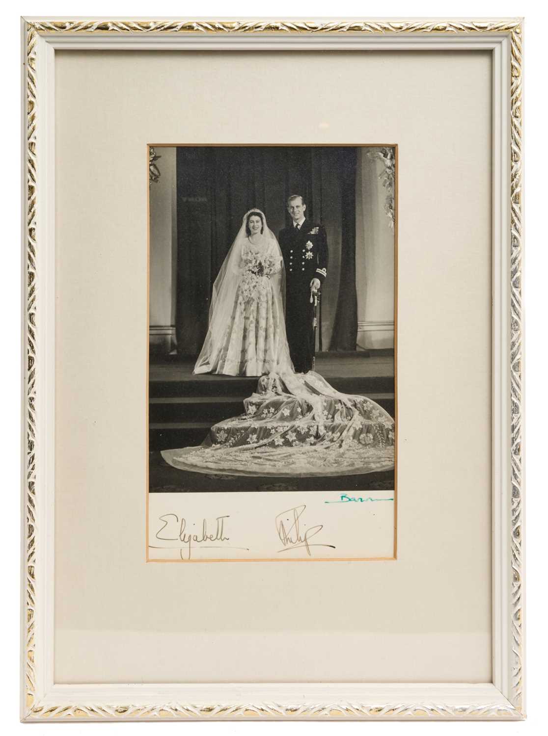 Lot 24 - The Wedding of H.R.H. The Princess Elizabeth to Lieutenant Philip Mountbatten R.N., signed 1947 wedding photograph by Baron in glazed frame
