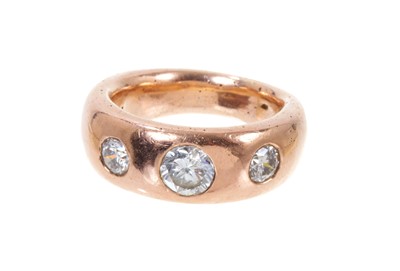 Lot 446 - Victorian style rose gold diamond three-stone gypsy ring, estimated total diamond weight approximately 2cts.