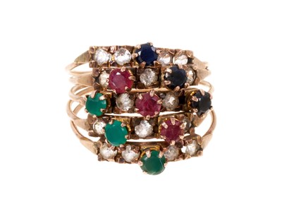 Lot 417 - Hareem ring with rubies emeralds and sapphires, and synthetic white stones, in gold setting
