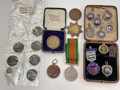 Lot 359 - Collection of silver and enamel sports fobs, WWI Victory medal, WWII Defence medal, together with other medals, medallions and coins