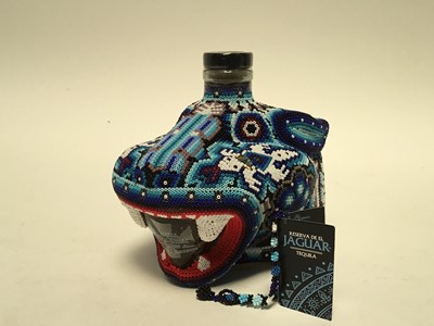 Lot 100 - One bottle, Chaquira Blanco Tequila, Reserva de el Jaguar, in beaded Jaguar formed head, in presentation display case