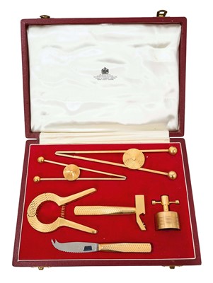 Lot 748 - 1970s Asprey gold plated cocktail making set in original fitted box