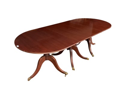 Lot 1323 - Regency style mahogany three pedestal dining table