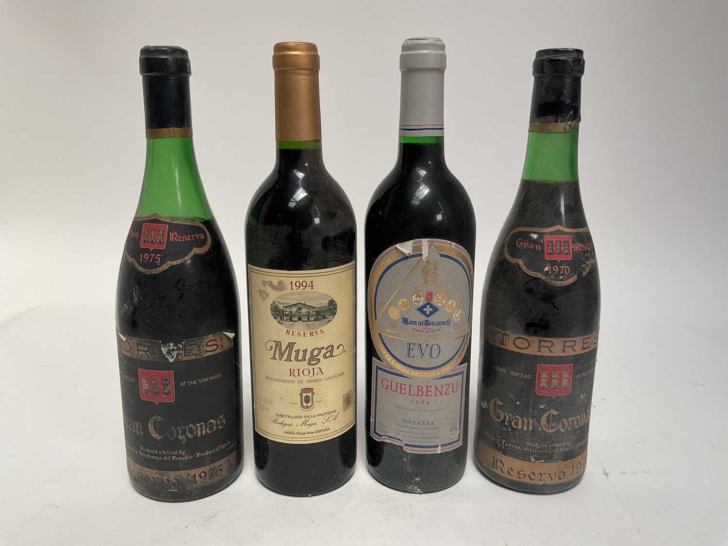 Lot 107 - Four bottles, Torres Gran Coronas Reserva 1970 and 1975, Evo Guelbenzu 1994, Muga Rioja 1994
