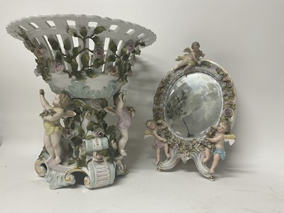 Lot 279 - Late 19th century German Sitzendorf porcelain table centre and a similar mirror (2)