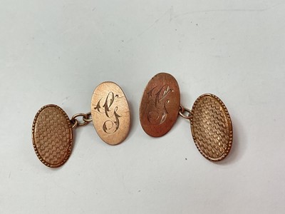 Lot 1043 - Pair of 9ct gold cufflinks with engraved G initial