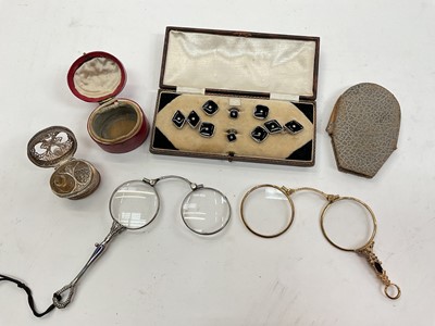 Lot 1045 - Cased set of dress studs, two pairs of lorgnettes and a white metal filigree perfume bottle box in red leather case