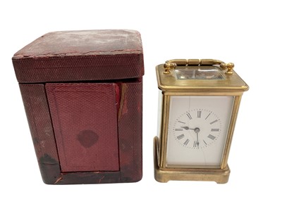 Lot 346 - Brass carriage clock in leather case