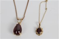 Lot 3267 - Gold mounted cabochon garnet and diamond...