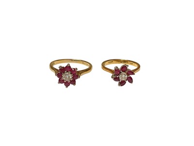 Lot 119 - Two 18ct gold diamond and ruby flower head rings