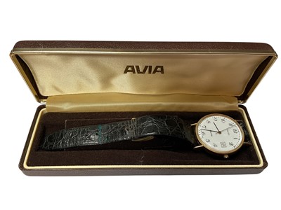 Lot 5 - Avia 9ct gold cased quartz wristwatch, 32mm diameter, on black leather strap, in case