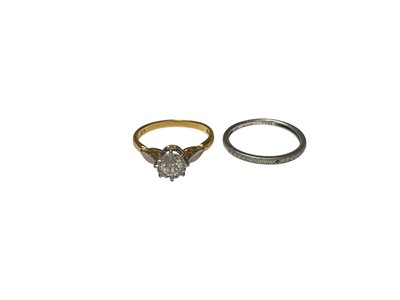 Lot 10 - Diamond single stone ring in 18ct gold setting and a platinum diamond half eternity ring (2)