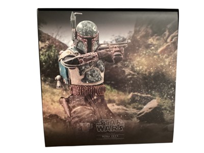 Lot 685 - Star Wars Hot Toys 1/6th scale Boda Fett Deluxe Version, with box TMS034 & Han Solo & Chewbacca MMS263 (DISPLAYED models contents may be incomplete) (2)