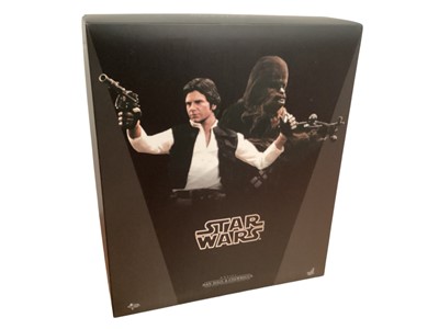 Lot 685 - Star Wars Hot Toys 1/6th scale Boda Fett Deluxe Version, with box TMS034 & Han Solo & Chewbacca MMS263 (DISPLAYED models contents may be incomplete) (2)