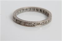 Lot 3283 - White gold (18ct) diamond eternity ring. Size R