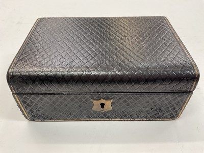Lot 1051 - Antique leather jewellery box