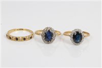 Lot 3289 - Two gold (18ct) sapphire and diamond cluster...