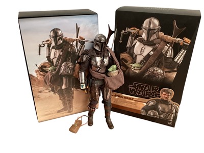 Lot 680 - Star Wars Hot Toys 1/6th scale Hunter TMS050, The Mandalorian & Grogu TMS052, Jango Fett MMS589 & Sideshow The Armorer TMS044, with boxes (DISPLAYED models contents may be incomplete) an...