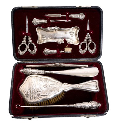 Lot 204 - Art Nouveau silver travelling dressing table set in case
